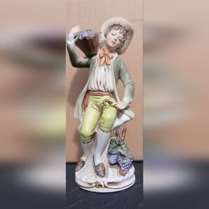 Vintage HOMCO collectible figurine Man holding grapes